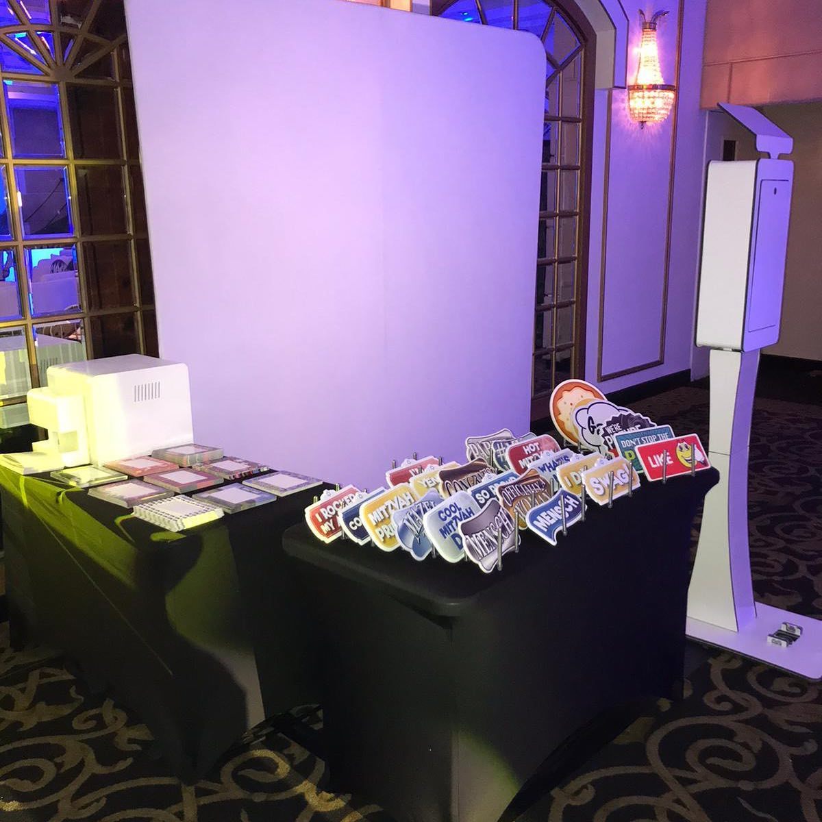 Photobooth prop table with backdrop