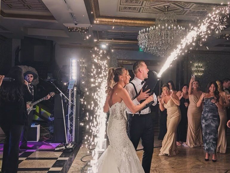 Bride and groom sparkler exit with live band